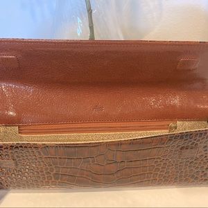 Abas brown leather clutch
